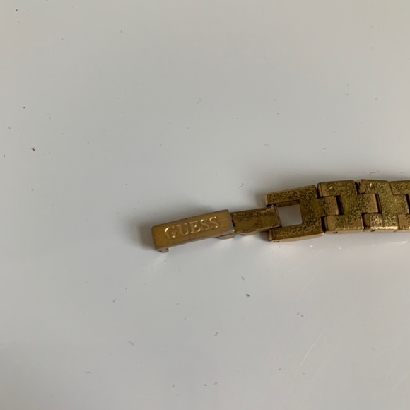 Guess interlocking G skinny gold watch main image 6